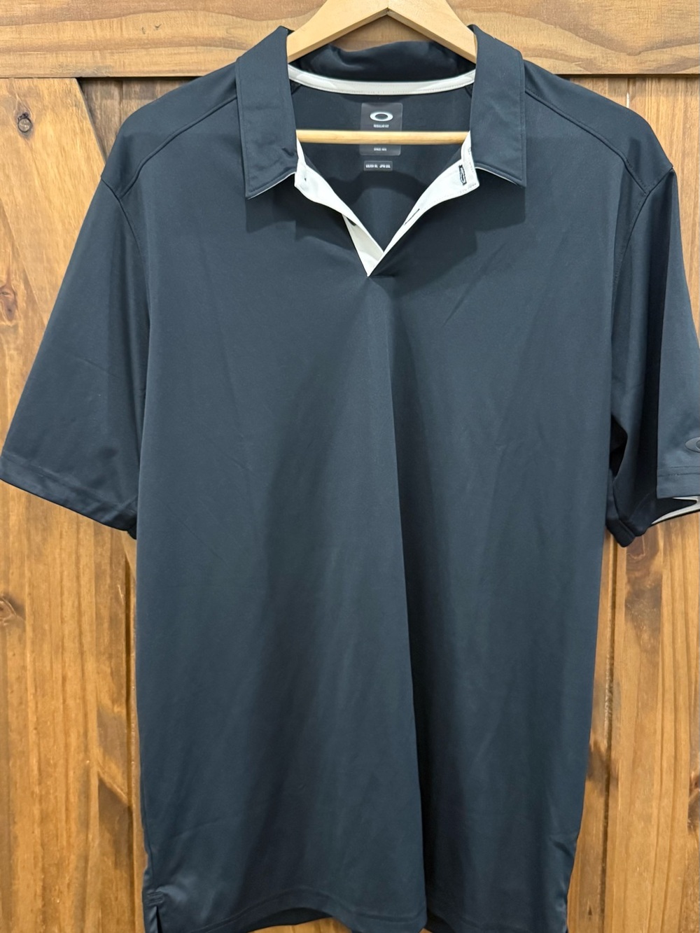 Oakley Black Polo with White Contrast Trim